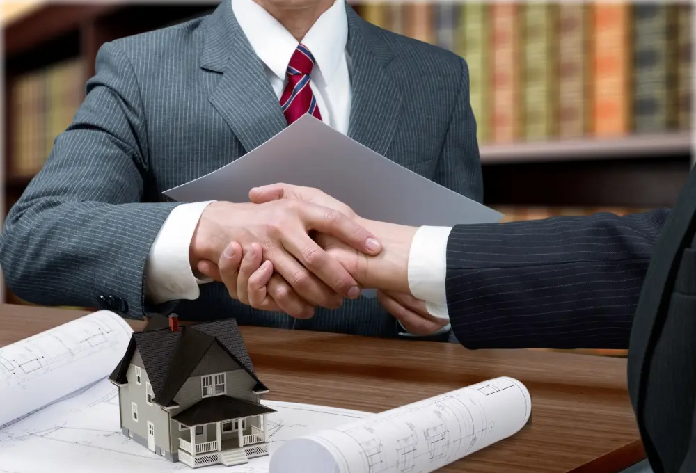 real estate broker handshaking meeting background