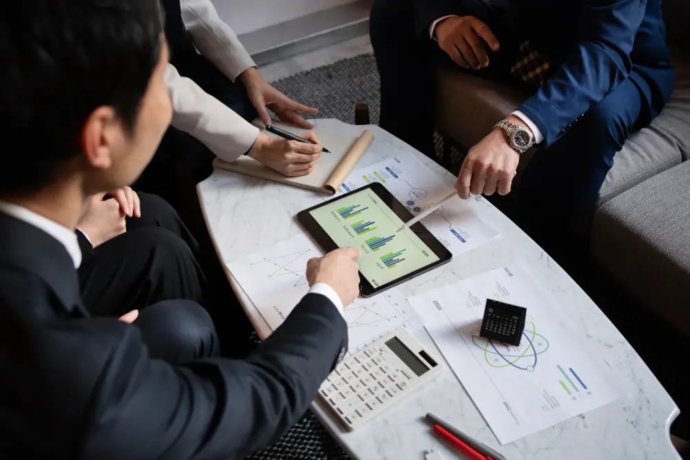 business people working with ipad